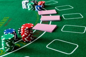 Gambling chips and playing cards on the table.